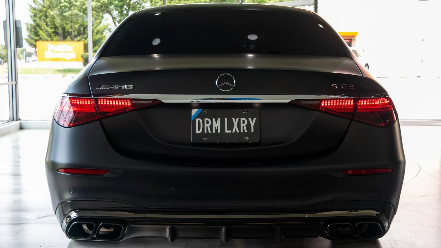 Matte black Mercedes-AMG S63 E Performance rental in Detroit, rear view