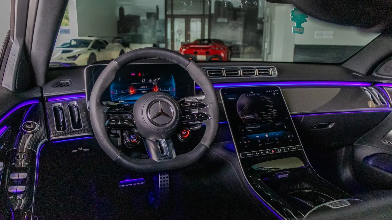 Matte black Mercedes-AMG S63 E Performance rental in Detroit, dashboard and AMG steering wheel