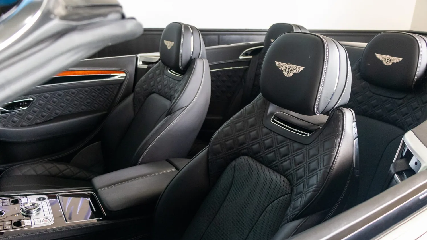 Black Bentley Continental GTC rental in Detroit, quilted leather seats