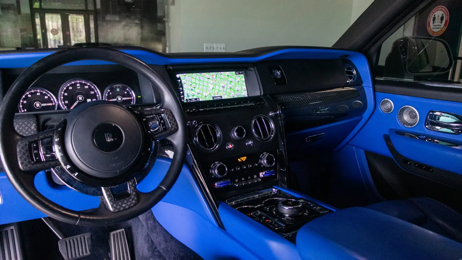 White Rolls-Royce Cullinan rental in Detroit, dashboard and steering wheel