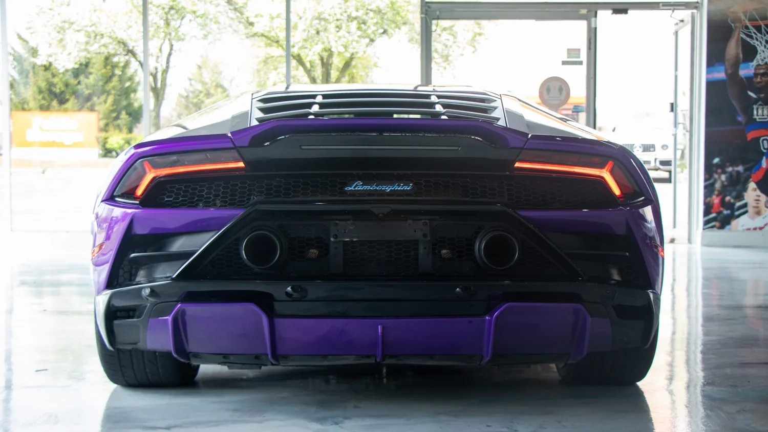 Purple Lamborghini Huracán EVO rental in Detroit, rear view
