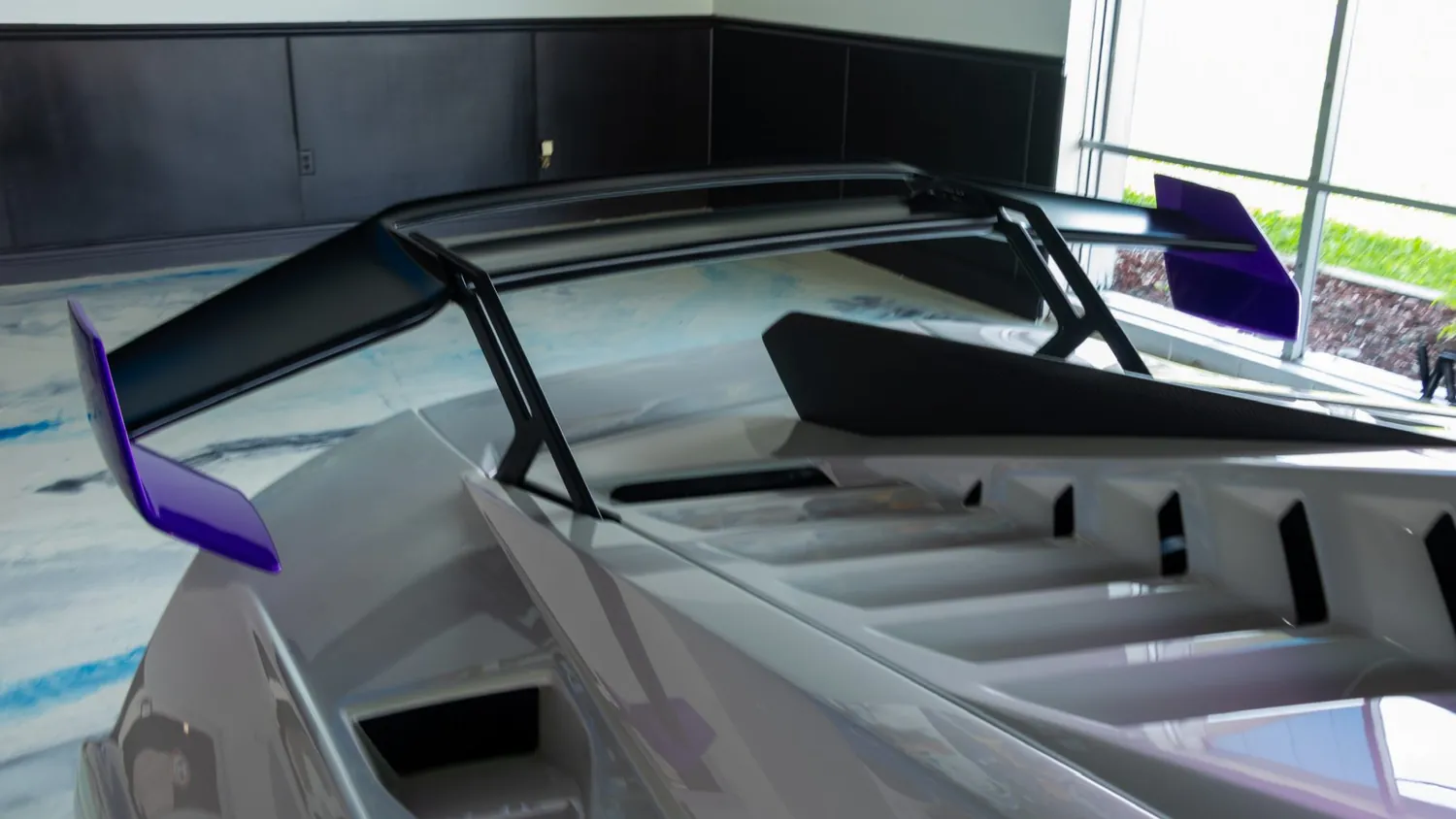 White Lamborghini Huracán STO rental in Detroit, rear wing detail