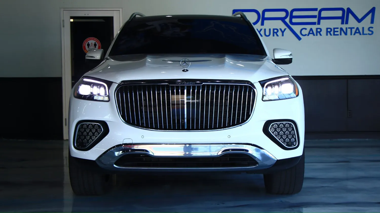White 2024 Mercedes-Maybach GLS 600 rental in Detroit, front grille and headlights