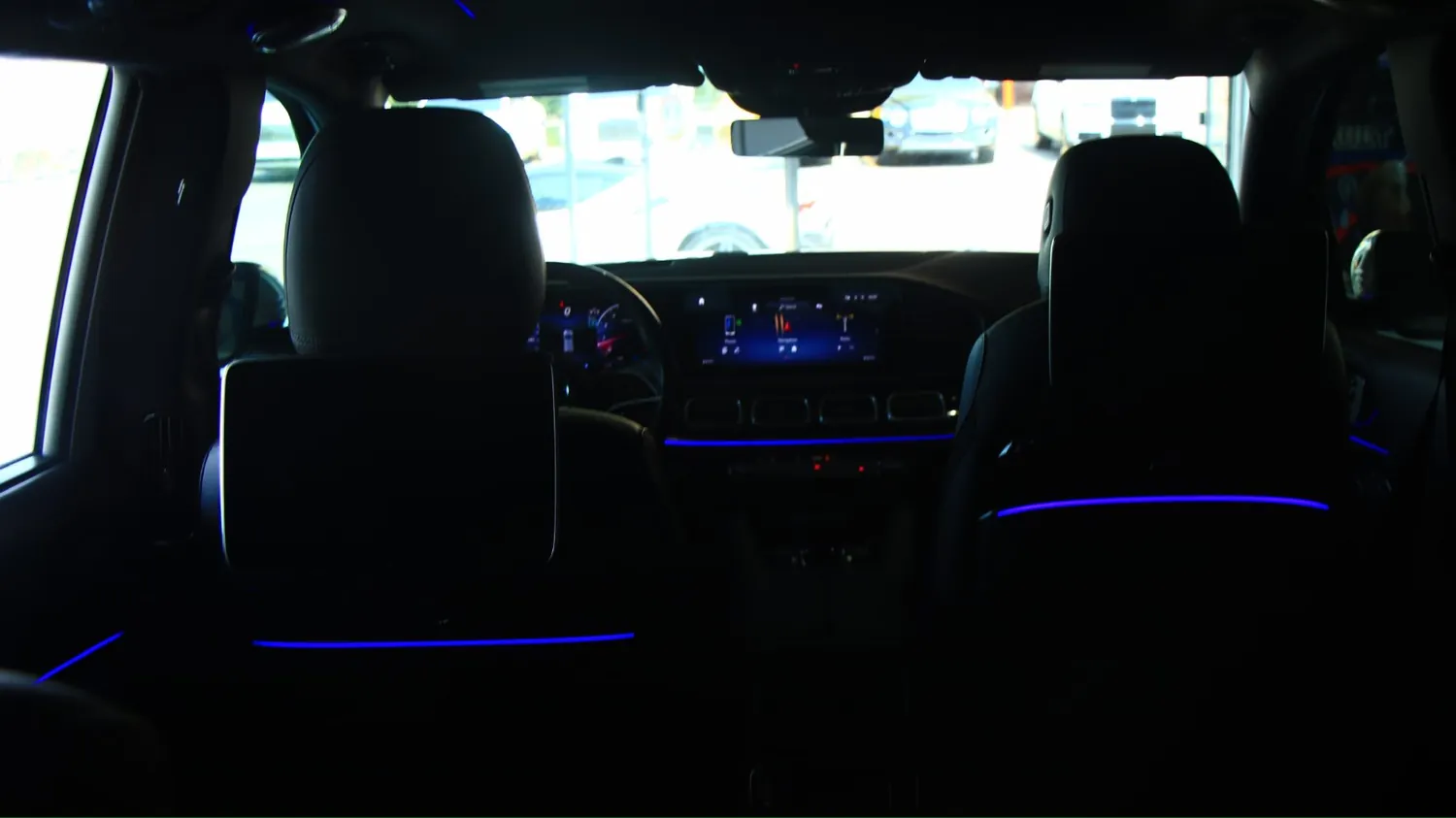 White 2024 Mercedes-Maybach GLS 600 rental in Detroit, rear cabin with ambient lighting