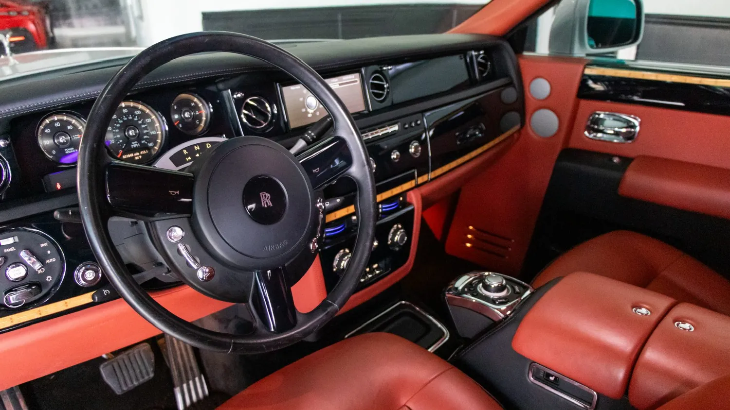 White 2017 Rolls-Royce Phantom rental in Detroit, dashboard and steering wheel