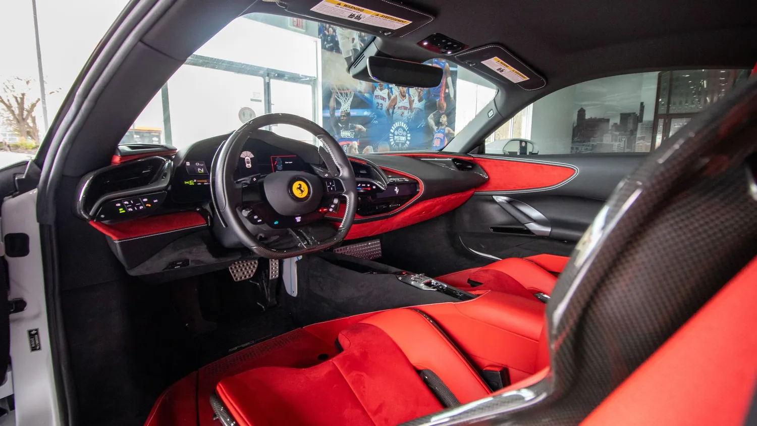 White Ferrari SF90 Stradale rental in Detroit, cockpit with red leather