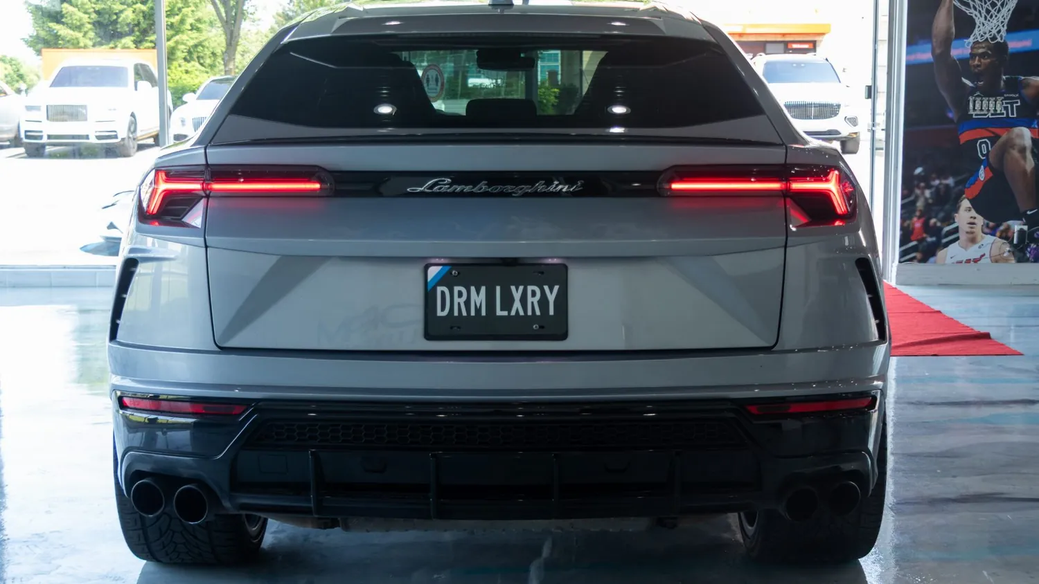 Gray 2022 Lamborghini Urus rental in Detroit, rear view
