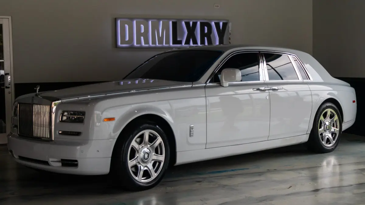 Rolls-Royce Phantom three-quarter view in the DRMLXRY showroom