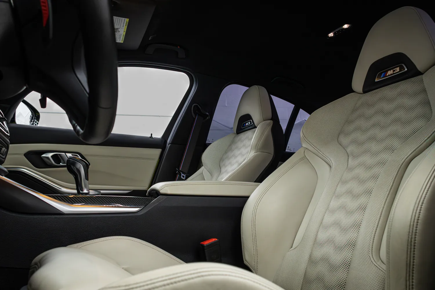 BMW M3 Competition front seat with illuminated M3 badge