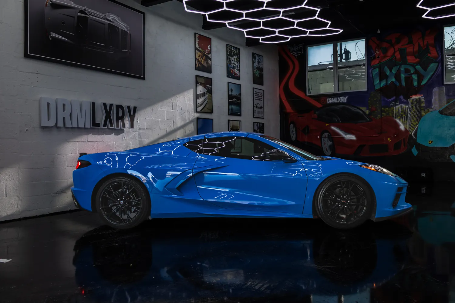 Blue Corvette Stingray side profile from the right