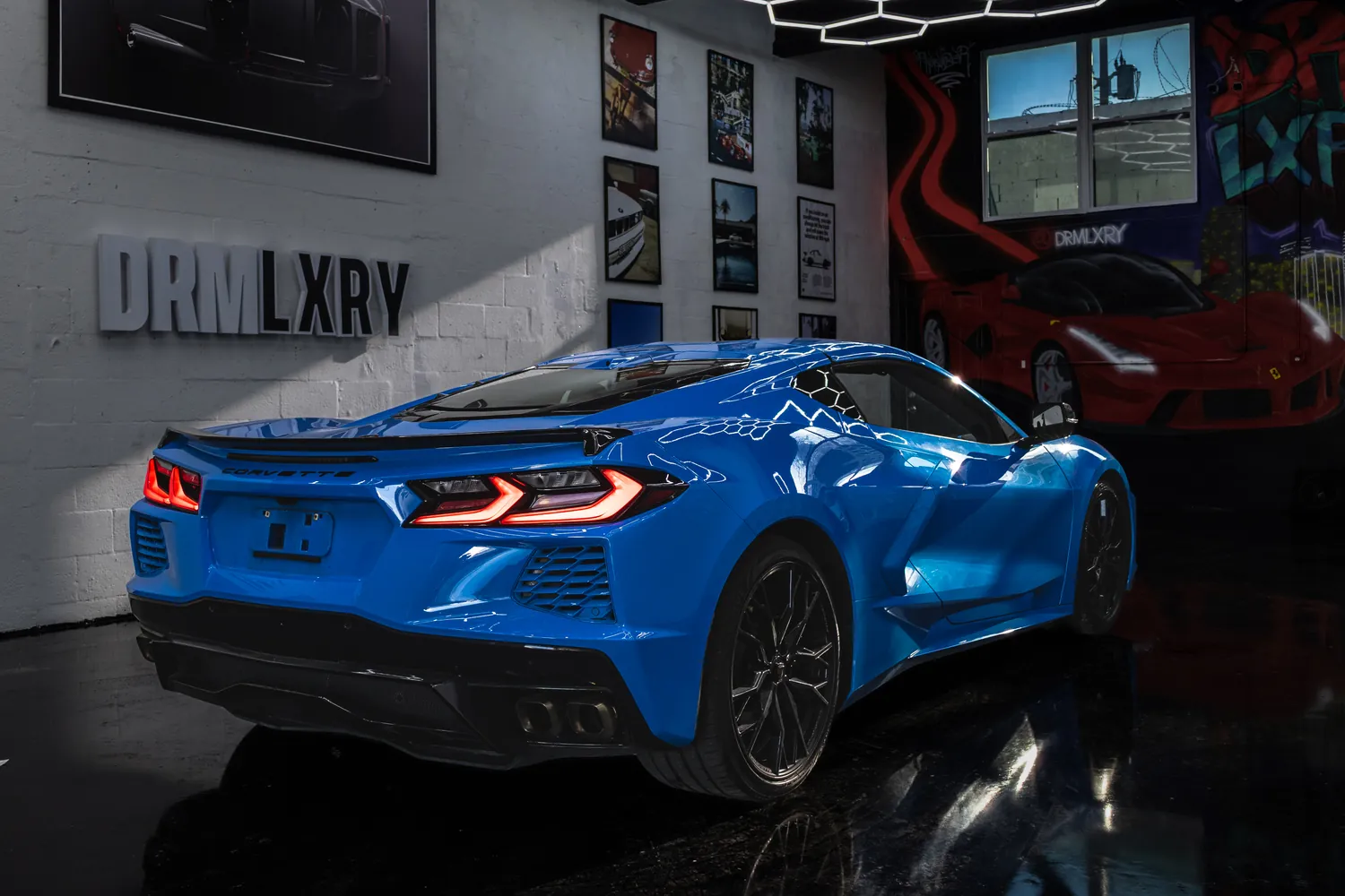 Blue Corvette Stingray, rear three-quarter view from the right