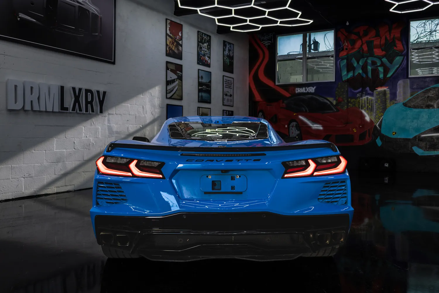 Rear view of the blue Corvette Stingray with quad exhaust