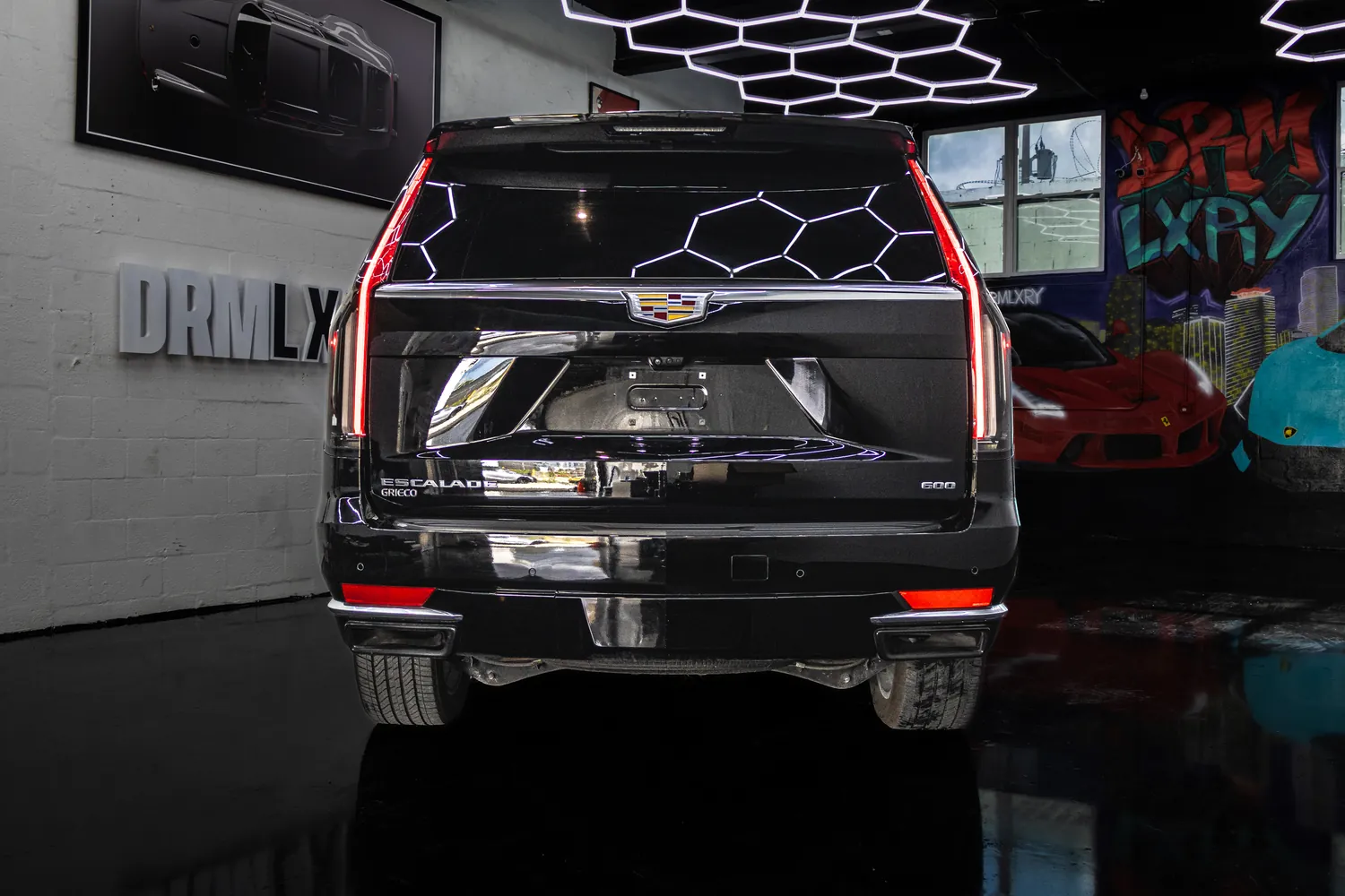 Rear view of the black Cadillac Escalade