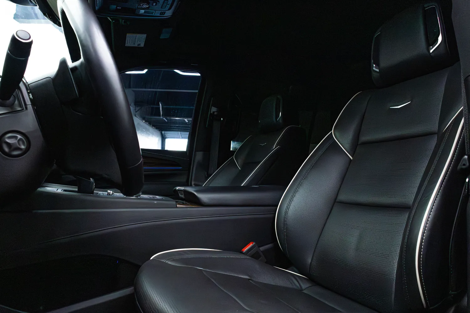Black leather front seats in the Cadillac Escalade