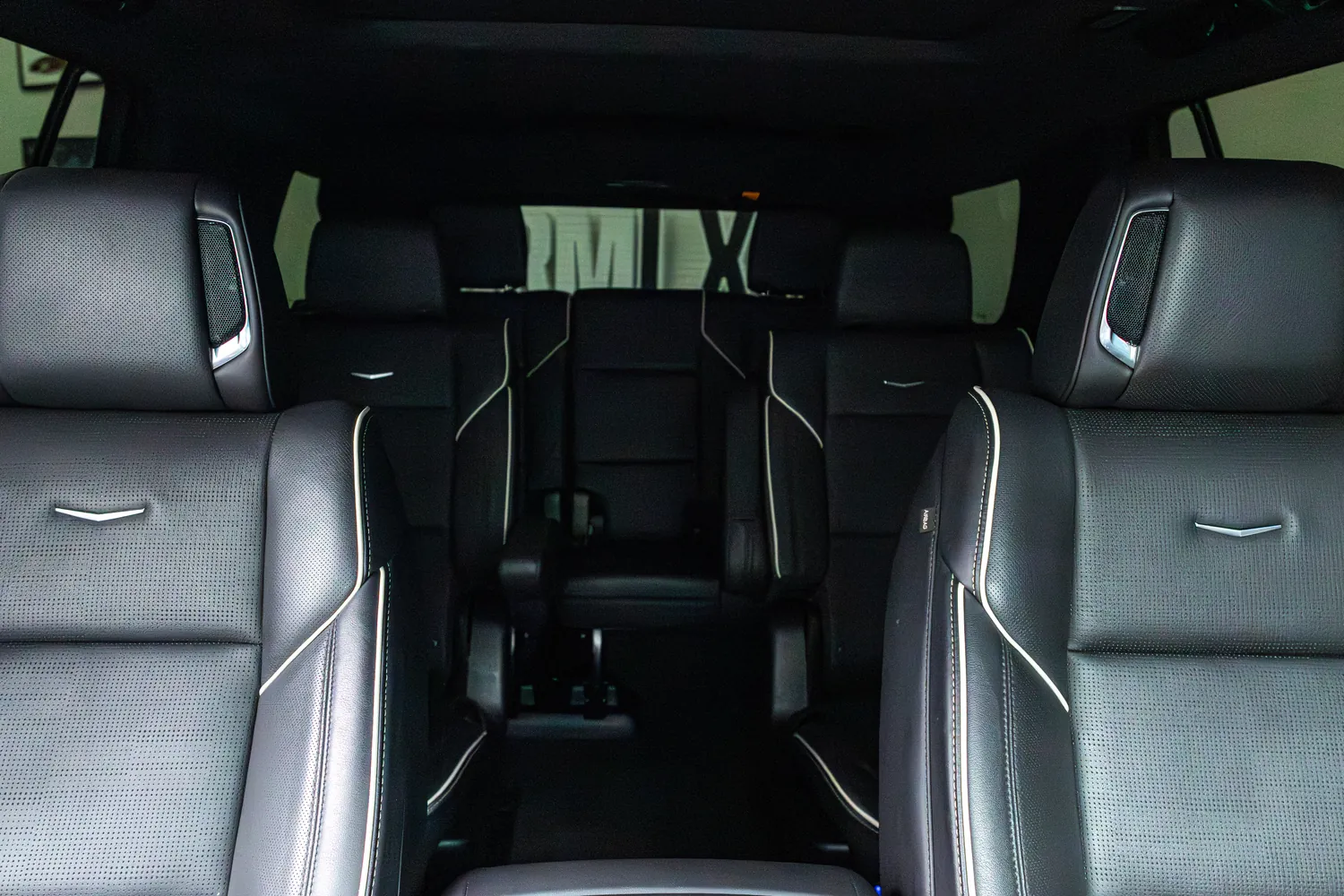 View back through the Cadillac Escalade's second and third rows
