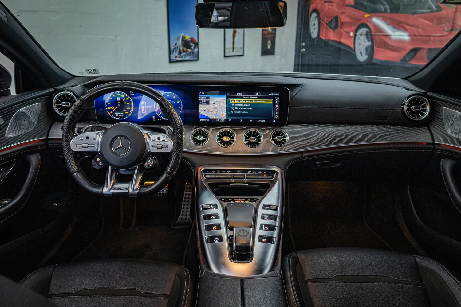 Mercedes-AMG GT53 dashboard with widescreen displays and AMG steering wheel