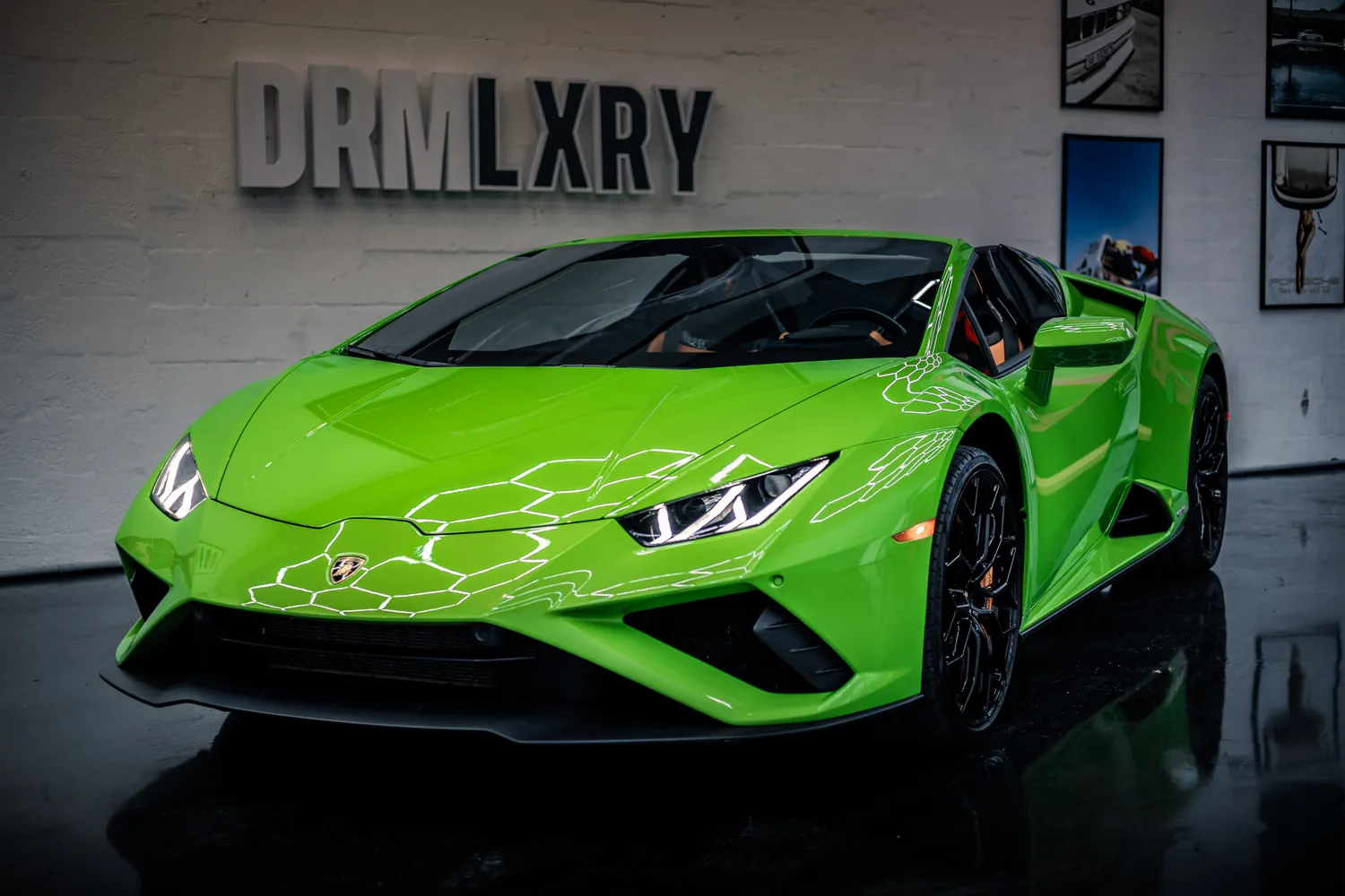 Close front three-quarter view of the green Lamborghini Huracán EVO Spyder