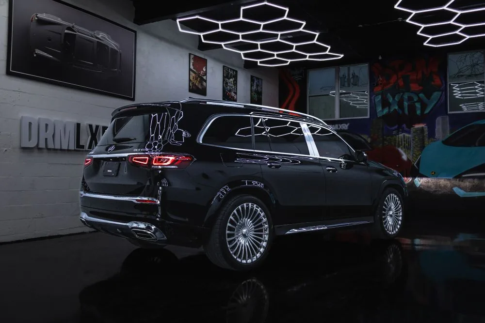 Black Mercedes-Maybach GLS 600, rear three-quarter view from the left