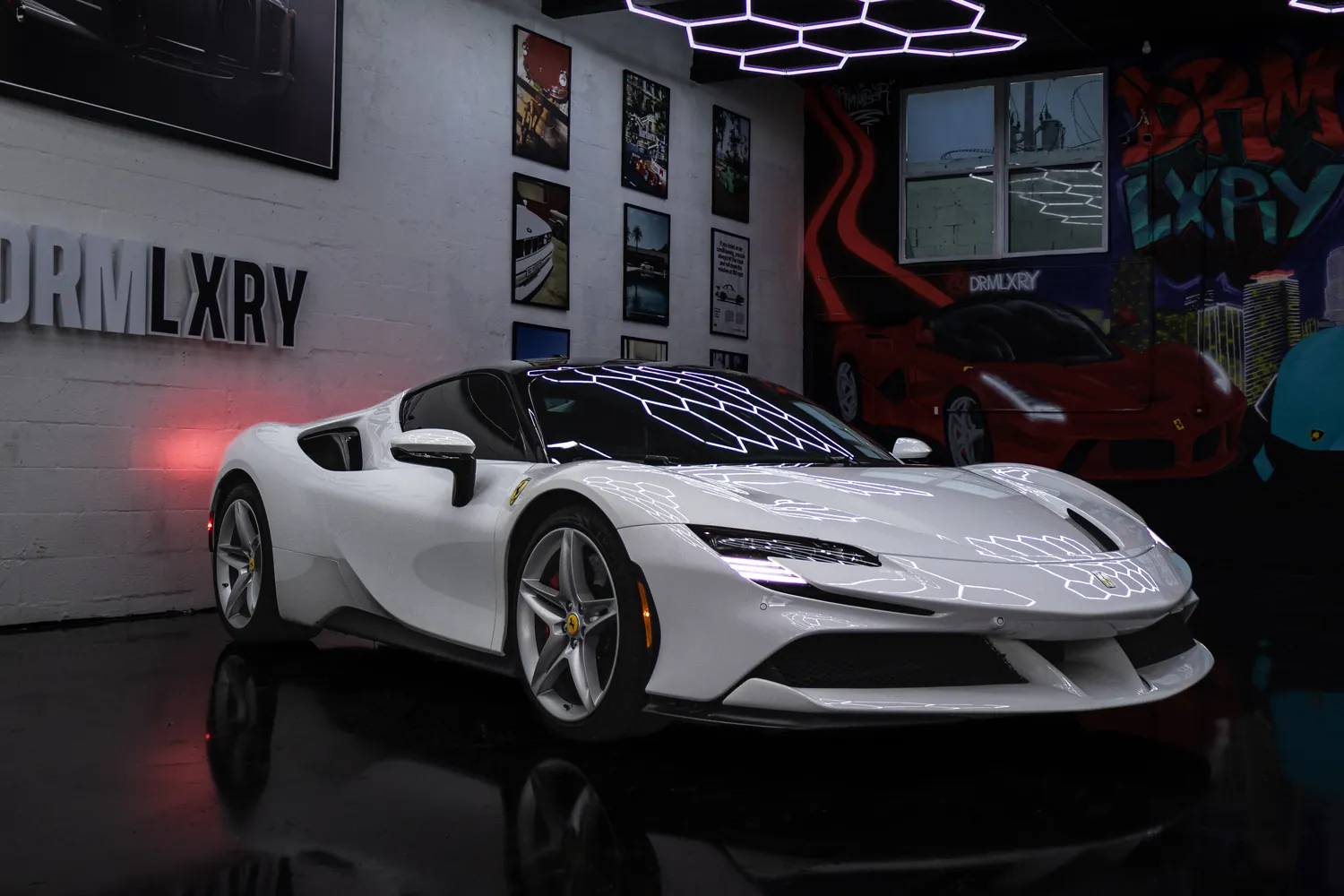 White Ferrari SF90 Stradale, front three-quarter view from the right