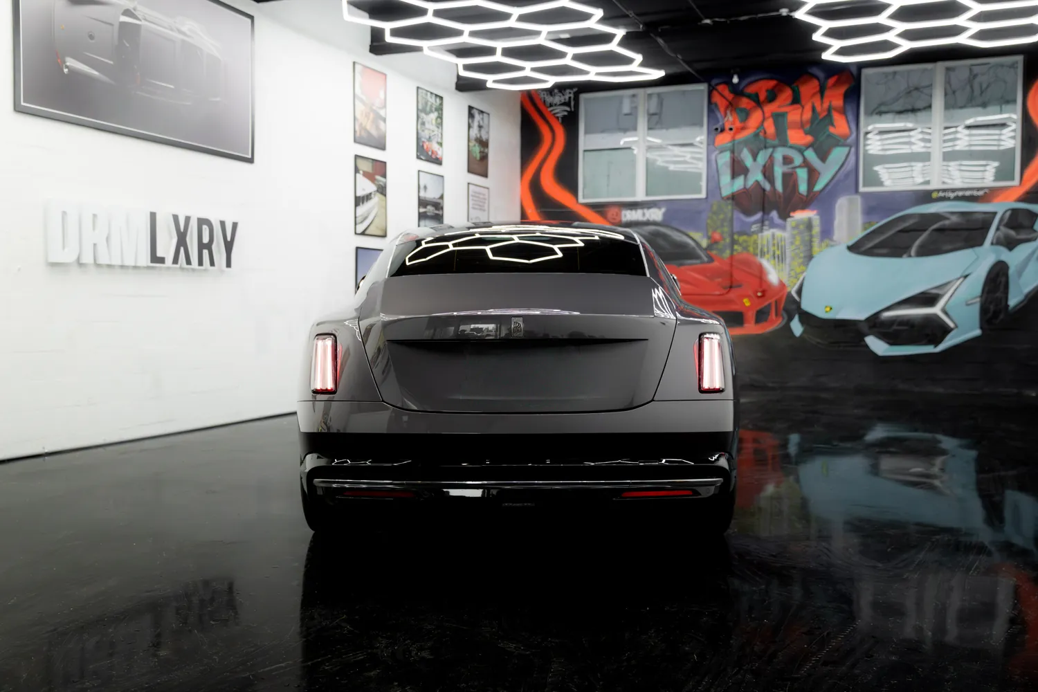 Rear view of the grey Rolls-Royce Spectre