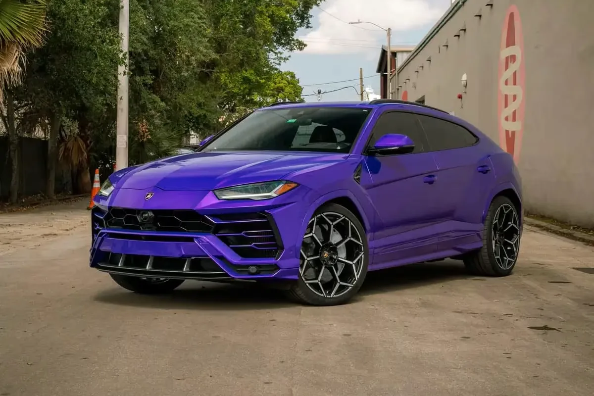 Purple Lamborghini Urus parked outdoors in Miami