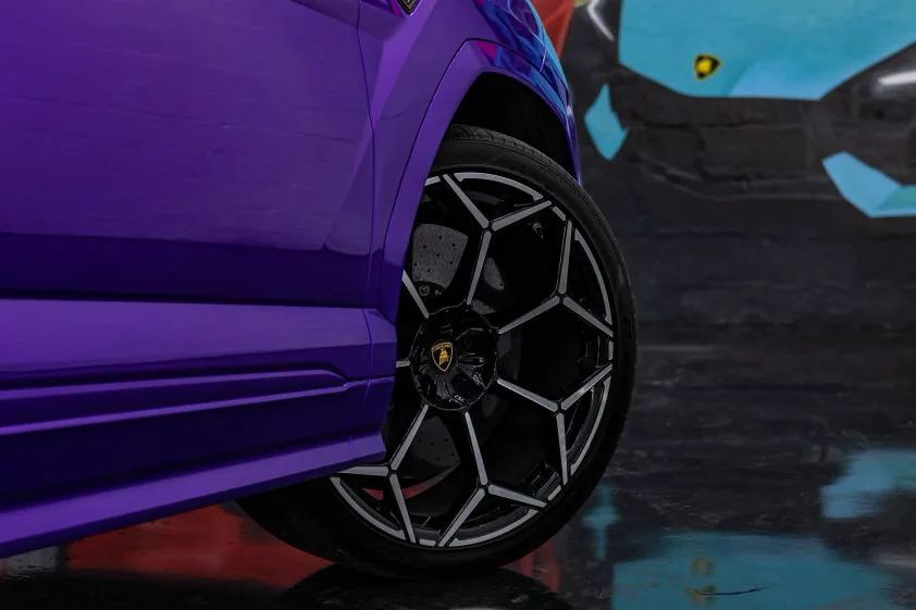 Lamborghini Urus wheel and purple bodywork