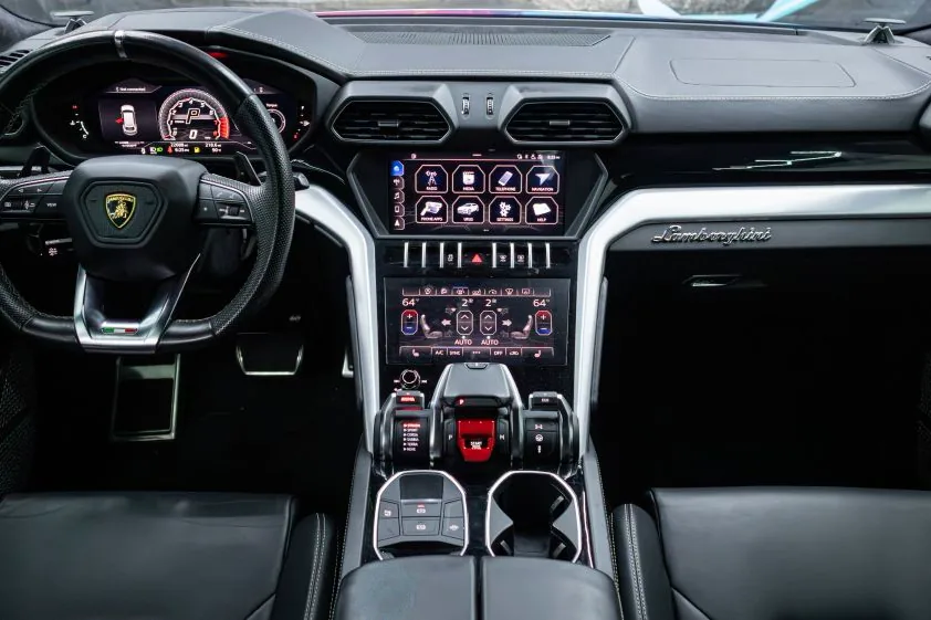 Lamborghini Urus dashboard with twin touchscreens and digital cluster